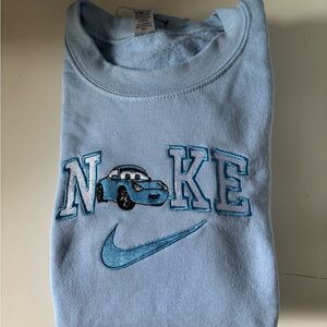 Nike Blue Long Sleeve Tee with Graphic Design